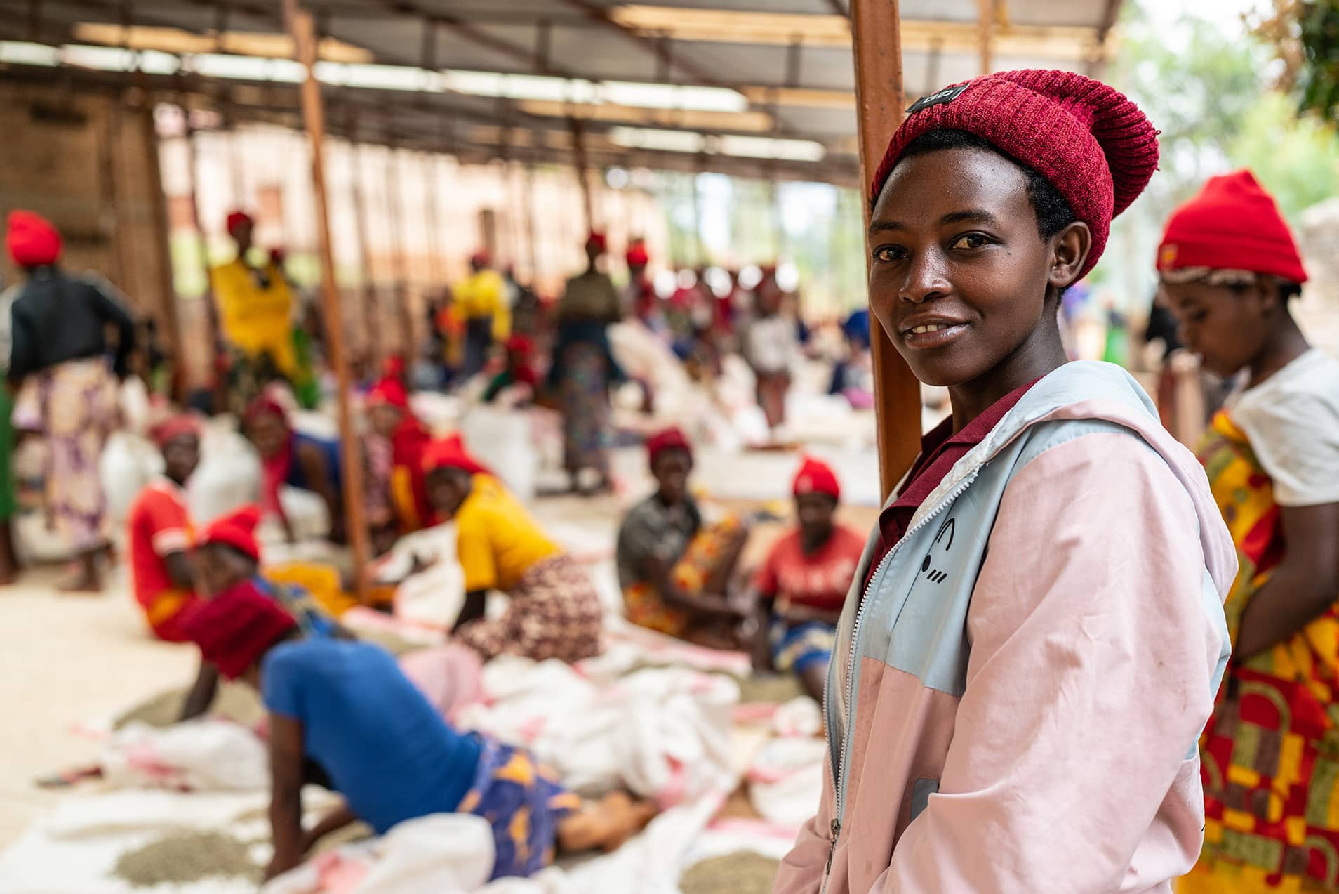 Maraba Cooperative employees and members in Rwanda sort coffee