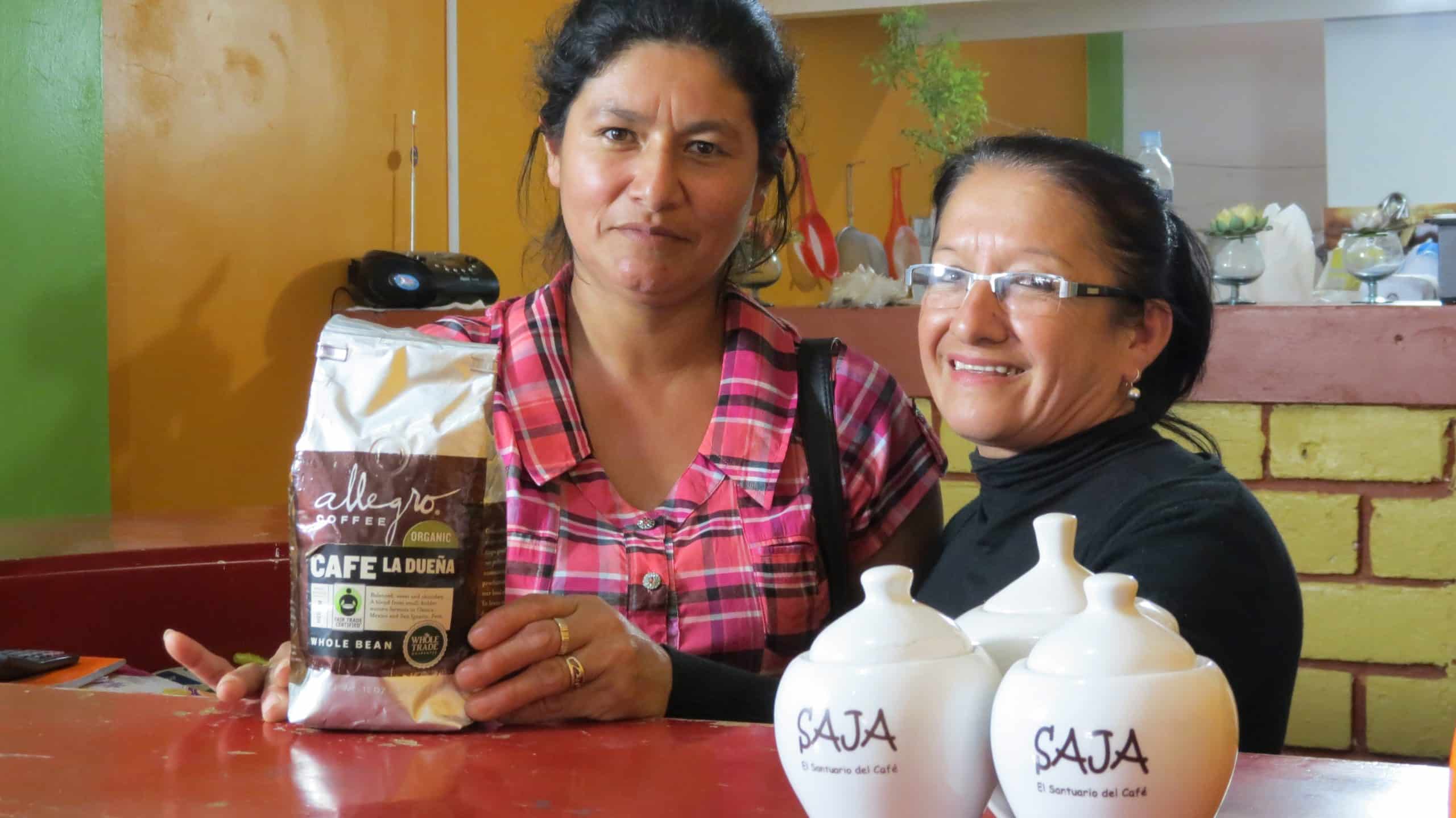 Dora Lisa and a farmer from the Aprocassi cooperative show off Allegro's Café la Dueña.