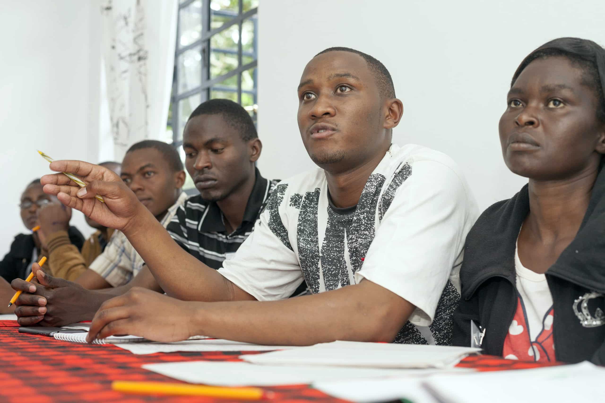 Managers from the Village Nut Company participating in a financial training. (Photo: Stuart Freedman)